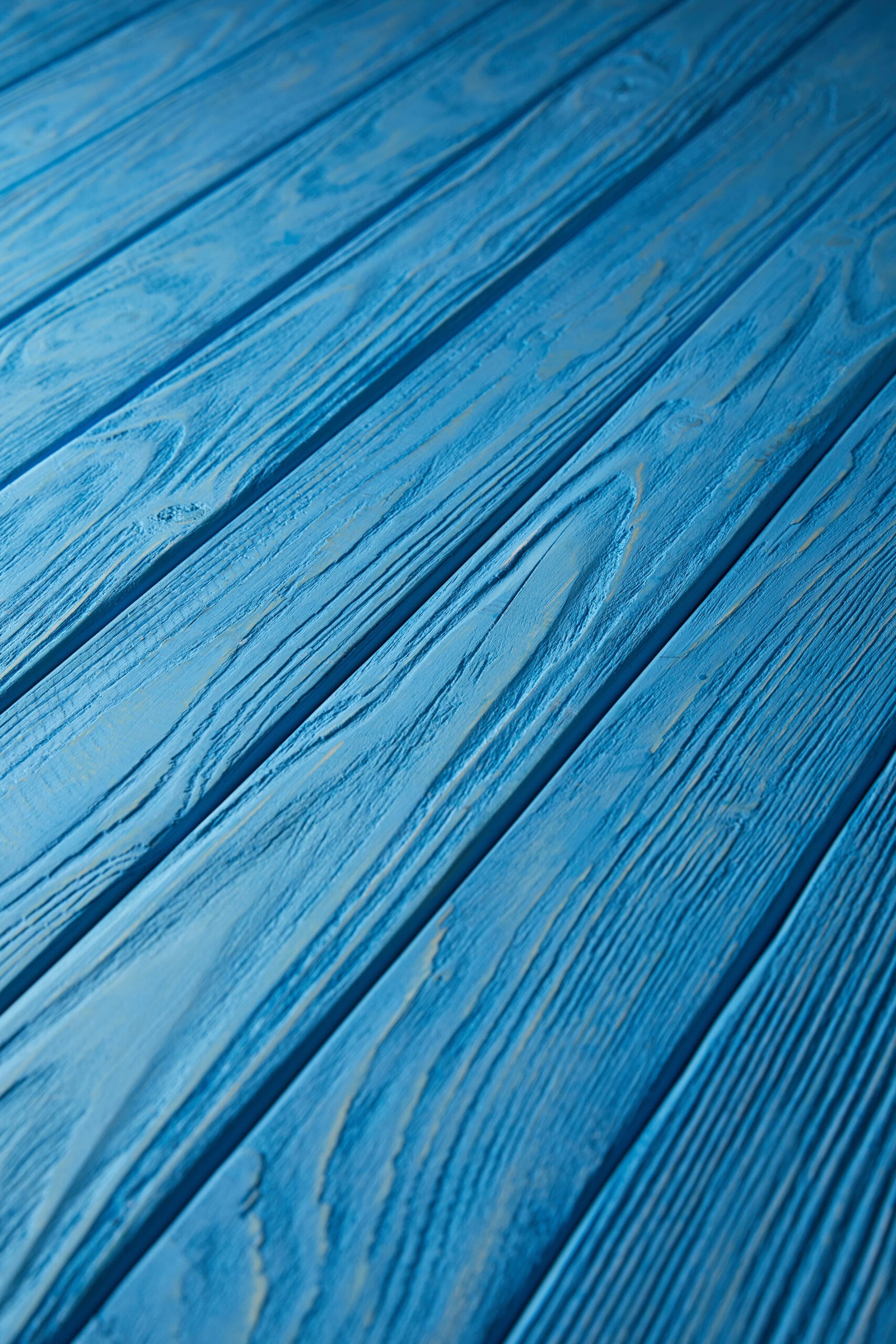 Blue stained wood plank texture for deck services